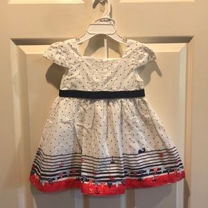 White with navy polka dot dress